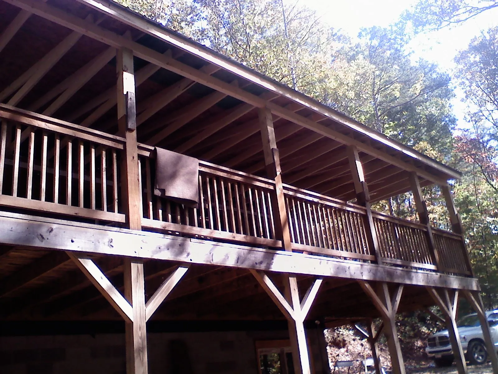 Timber framing under a new elevated porch and deck — Roof Leak Repair in San Juan Bautista by Roofing Brothers